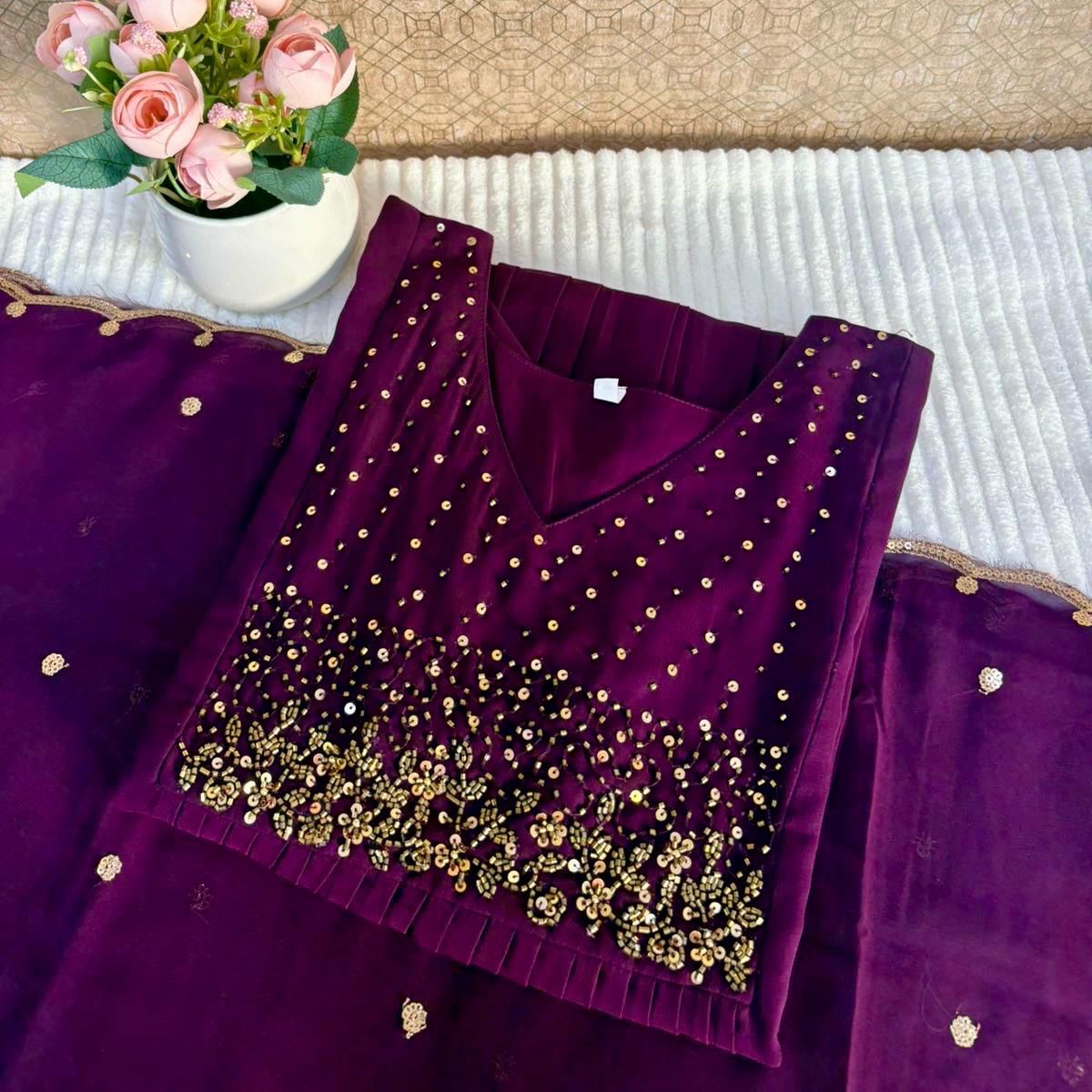 1. A HEAVY HANDWORK KURTHI