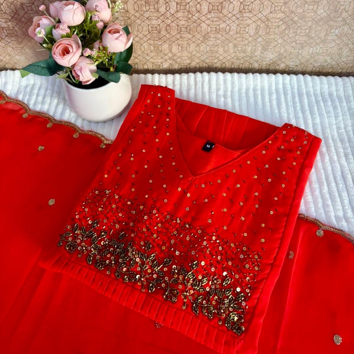 1. A HEAVY HANDWORK KURTHI