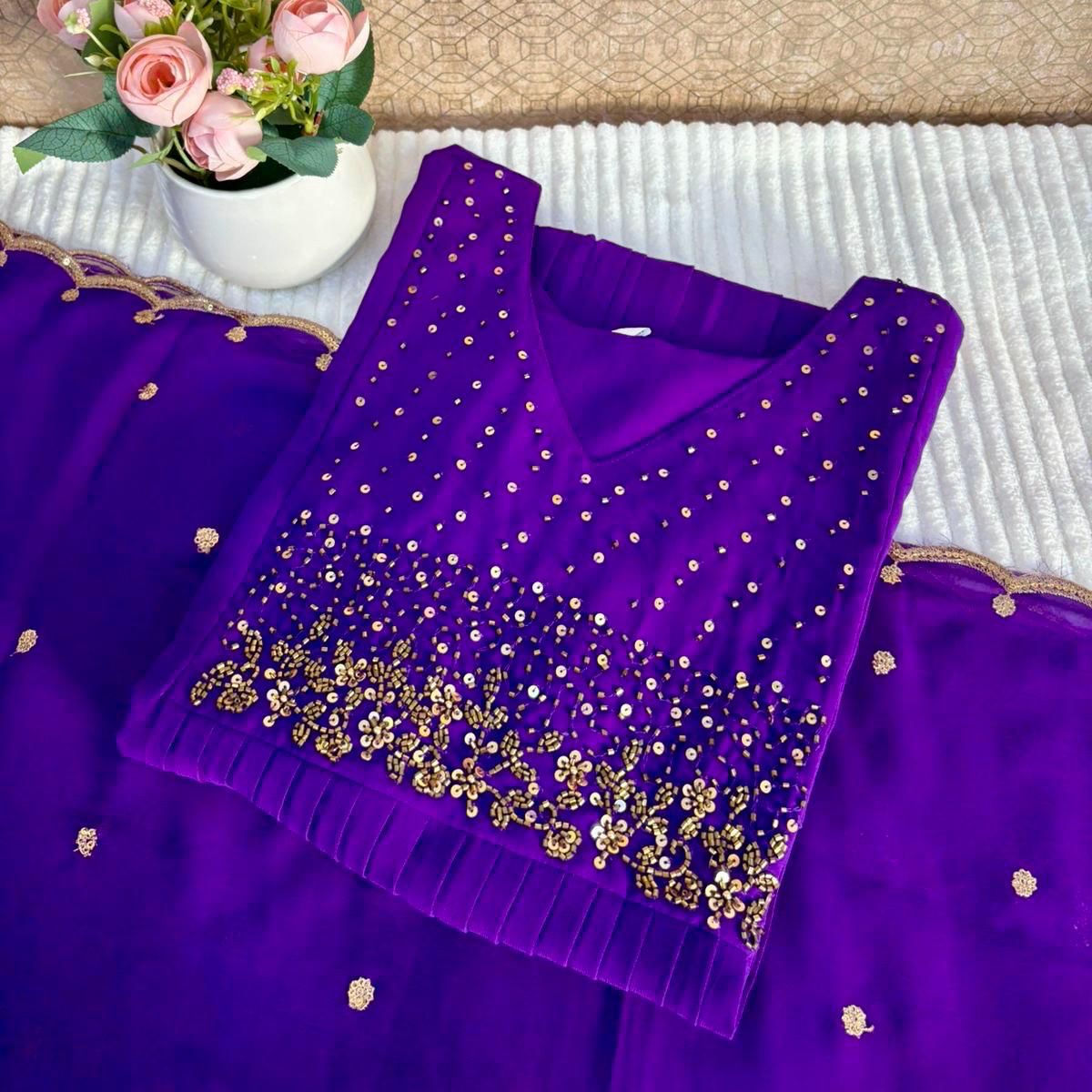 1. A HEAVY HANDWORK KURTHI